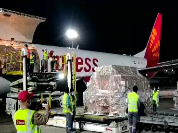 COVID-19 medical supplies being off-loaded from SpiceJet freighter. Photo/ANI