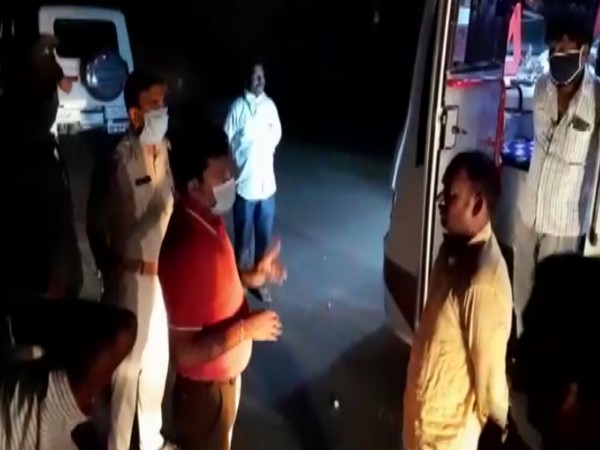 Occupants of the bus carrying marriage party members being questioned by police in Andhra Pradesh. photo/ANI