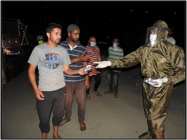 Indian Army assist stranded commuters on NH-44 after landslide in Ramban on Saturday. Photo/ANI