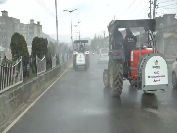 Boom sprayers sanitising Srinagar city on Saturday. Photo/ANI