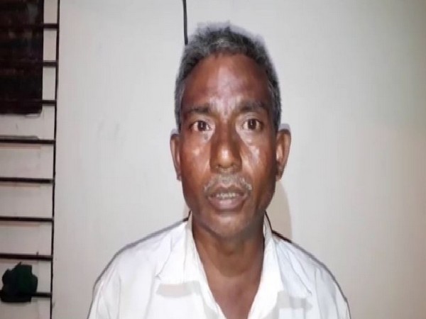 Srinivas, the electrician who cut of power supply of a police station after being fined for not wearing helmet. Photo/ANI