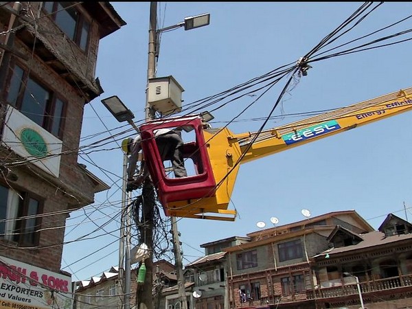 LED street lights being installed in Srinagar. Photo/ANI