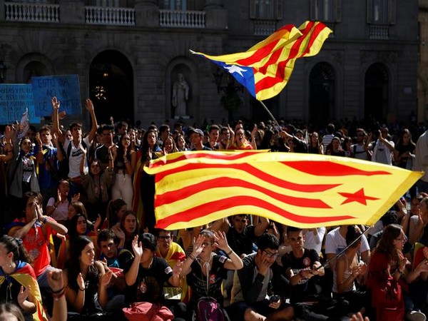 Students wave Catalan flags on Thursday during a protest on Thursday