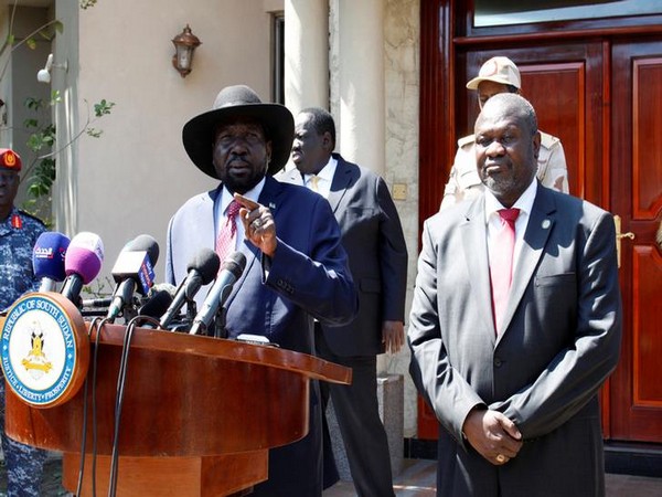 President of South Sudan, Salva Kiir addressing a conference with rebel leader Riek Machar