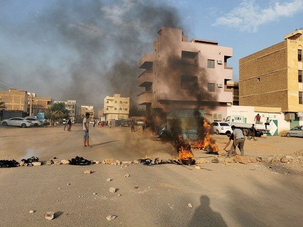 Protesters block a road in Khartoum. (Photo Credit - Reuters)