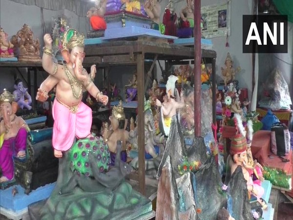 A Surat-based idol maker has made a 'Coronavirus killer Ganesha idol', ahead of Ganesh Chaturthi celebrations. [Photo/ANI]