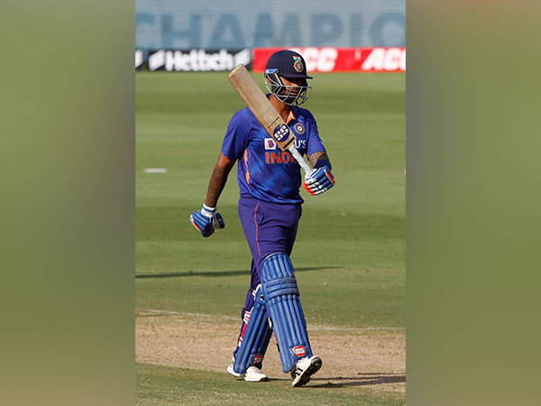 Suryakumar Yadav lifts his bat after notching up a half-century (Image: BCCI)