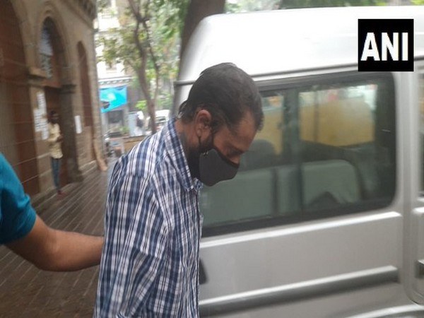 Reigel Mahakal being taken out of the Narcotics Control Bureau (NCB) office for medical examination on Friday.