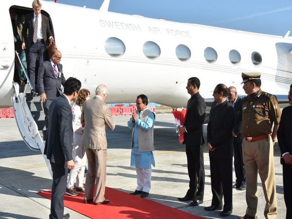 Swedish King Carl XVI Gustaf and Queen Silvia being received by Dhan Singh Rawat at the Jolly Grant Airport in Dehradun on Thursday