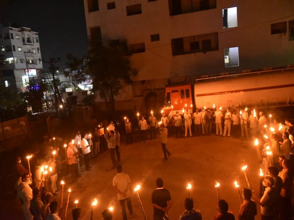 TDP leaders held a torch rally at Gollapudi village here on Wednesday. (Photo/ANI)