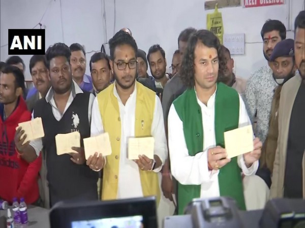 RJD leader Tej Pratap Yadav with supporters holding Azadi Patra in Patna. (Photo/ANI)