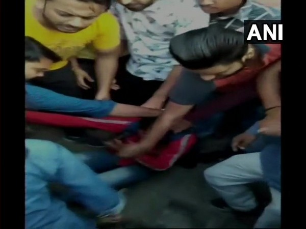 A man was thrashed by a girl in Haridwar [Photo/ANI]