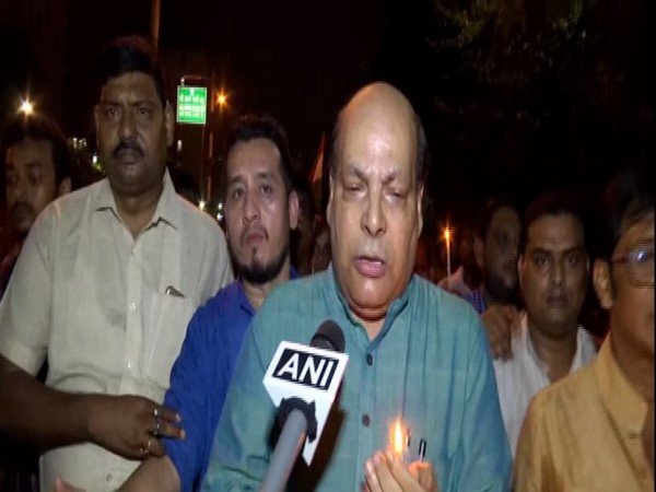 TMC leader Omprakash Mishra talking to ANI during the candle march on Monday. Photo/ANI
