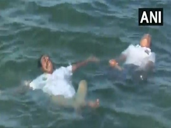 People were seen practicing yoga asanas in Palk Strait here on Sunday. (Photo/ANI)