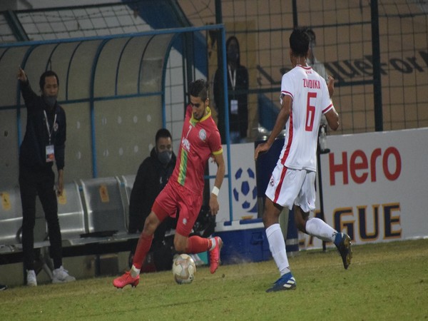 TRAU FC's Komron Tursunov on the ball against Aizawl FC. (Photo/ AIFF)