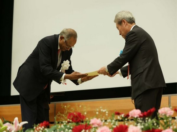 Srinivasan receiving the award in Tokyo on Wednesday