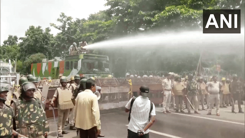 Police use water cannon to disperse BJD workers protesting over Balasore student's death by self-immolation. (Photo/ANI) Police use water cannon to disperse BJD workers protesting over Balasore student's death by self-immolation. (Photo/ANI)