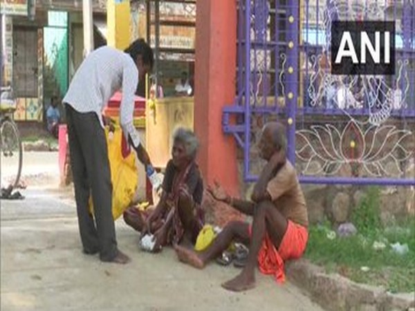 Tamilasaran, feeding the needy in Madurai. Photo/ANI