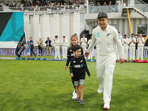 New Zealand batsman Ross Taylor, with his kids, stepping on the field at Basin Reserve on Friday.