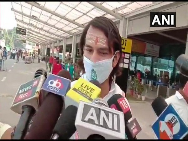 RJD leader Tej Pratap Yadav talks to reporters on Thursday. (Photo/ANI)