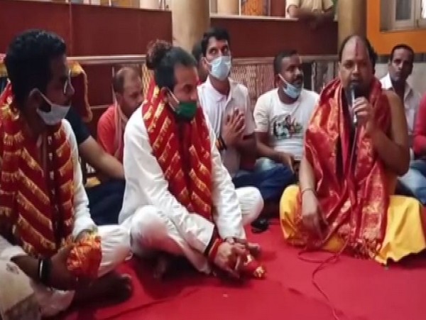 'Lalu Rabri Morcha' leader Tej Pratap Yadav offering prayers at temple on father Lalu Prasad Yadav's 73rd birthday in Patna on Thursday. Photo/ANI
