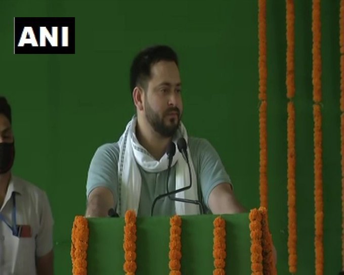 RJD leader Tejashwi Yadav speaking at the party function in Patna on Sunday. Photo/ANI