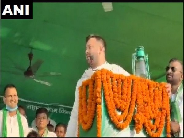RJD leader Tejashwi Yadav addressing a rally on Sunday. Photo/ANI