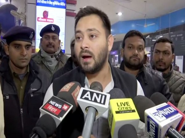RJD leader Tejashwi Yadav speaking to reporters in Patna on Sunday. Photo/ANI