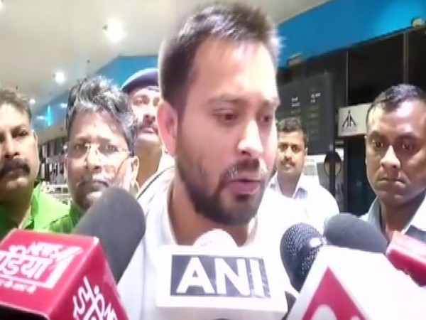 RJD leader Tejashwi Yadav talking to reporters in Patna, Bihar on Wednesday. Photo/ANI