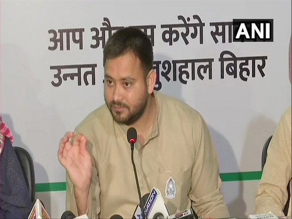 RJD leader Tejashwi Yadav addressing a press conference in Patna on Friday.