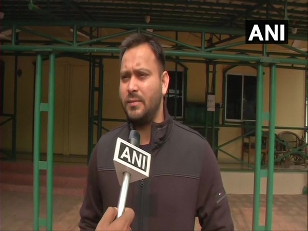 RJD leader Tejashwi Yadav speaking to ANI in Ranchi on Monday. (Photo/ANI)
