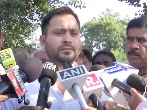RJD leader Tejashwi Yadav speaking to reporters in Patna on Tuesday. Photo/ANI