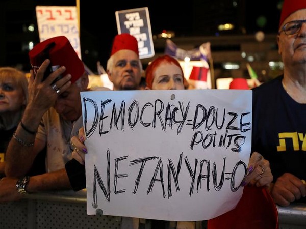 Israelis hold a demonstration in Tel Aviv, Israel on Saturday