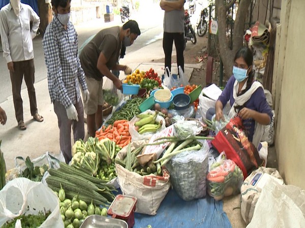 Woman selling vegetable after losing job at MNC in Hyderabad. Photo/ANI 