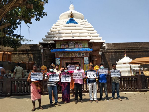 The administration of Lingaraj Temple launched an awareness drive to prevent the spread of fatal COVID-19 in Bhubaneswar. Photo/ANI