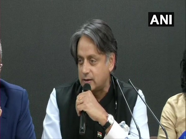 AIPC chairman Shashi Tharoor speaking to reporters in New Delhi on Sunday.