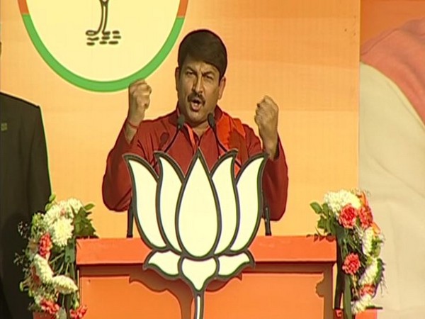 Delhi unit BJP president Manoj Tiwari speaking at an election rally on Monday in New Delhi. Photo/ANI