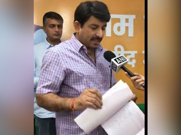 Delhi BJP chief Manoj Tiwari speaking to ANI on Sunday. Photo/ANI