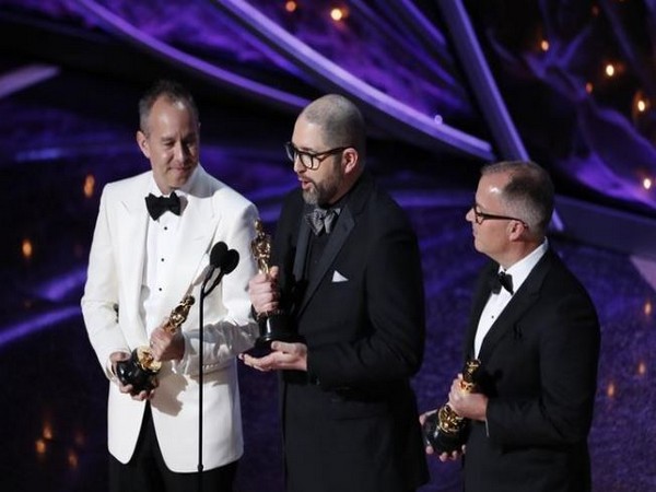 Josh Cooley, Mark Nielsen and Jonas Rivera win the Oscar for Best Animated Feature Film for 'Toy Story 4' at the 92nd Academy Awards.