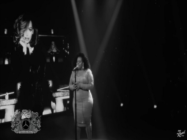 A still from the show featuring Amber Riley paying tribute to Naya Rivera (Image source: YouTube)