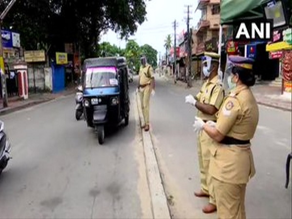 Thiruvananthapuram Police checking IDs of people as they move about for their daily chores amid citywide lockdown.