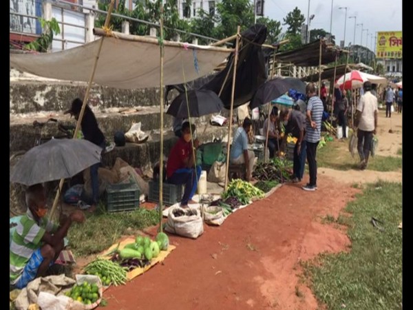 Lake Chowmuhani Bazar relocated to Vivekananda Stadium in Tripura amid COVID-19 on Sunday. Photo/ANI
