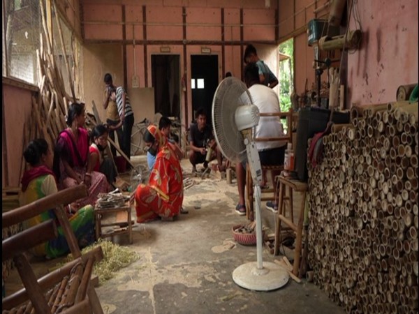 Workers at manufacturing factory of bamboo bottles in Tripura on Wednesday. Photo/ANI