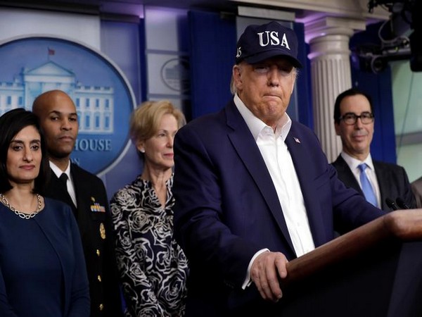 US President Donald Trump pauses during a press briefing with members of the Coronavirus Task Force at the White House in Washington
