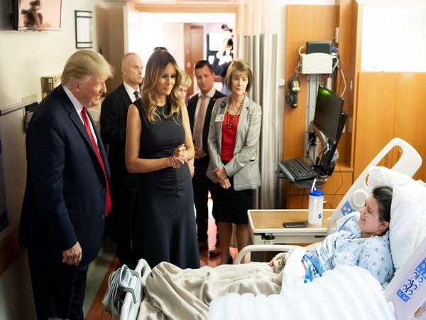 US President Donald Trump and First Lady Melania Trump meets a shooting victim at a hospital in Dayton on Wednesday. (Picture Credits: Trump's Twitter)