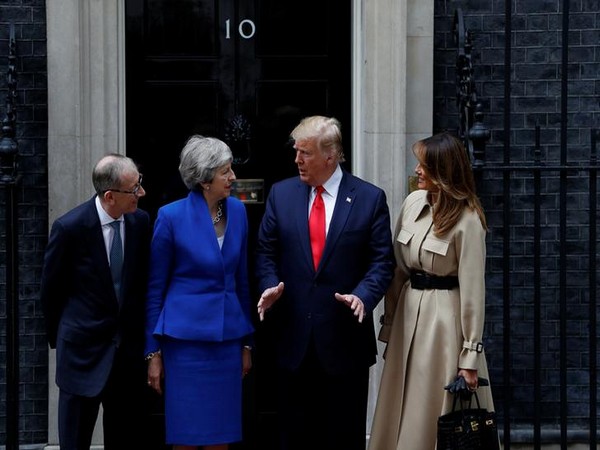US President Donald Trump and First Lady Melania Trump meet Britain's Prime Minister Theresa May and her husband Philip at Downing Street on Tuesday