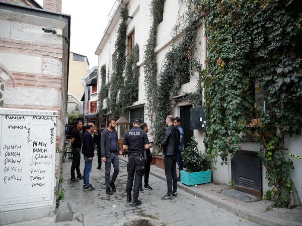 Turkish police officers stand outisde the home office of James Le Mesurier, founder of the Mayday Rescue group, in Istanbul