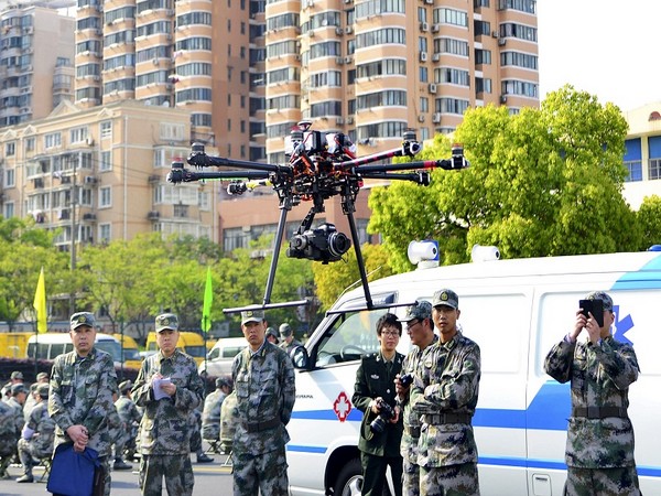 A team of Chinese military flying drones. (Photo Credit - Reuters)