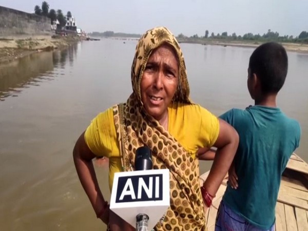 A woman speaking to ANI in Uttar Pradesh on Sunday. Photo/ANI