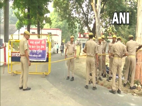 UP police personnel deployed outside MoS Ajay Mishra Teni's resident on Saturday (Photo/ANI)